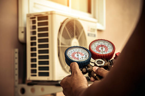 Professional Hvac technician working in Gardner, MA
